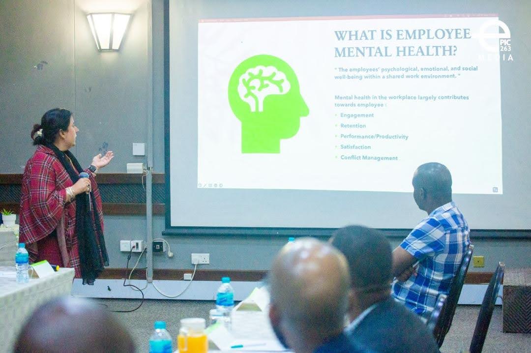 Coach Mel facilitating a workplace wellness session